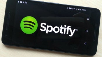 Spotify's shares open at $165.90 valuing the music streamer at $29 billion