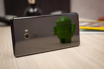 Xiaomi's shares drop 5.8% and then rebound to trade near its IPO price