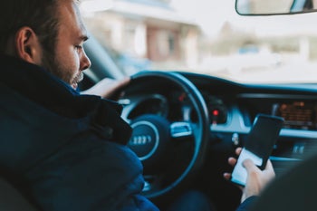 Can't touch this! Georgia's draconian phone-in-car law nets 1000 tickets for 10 days