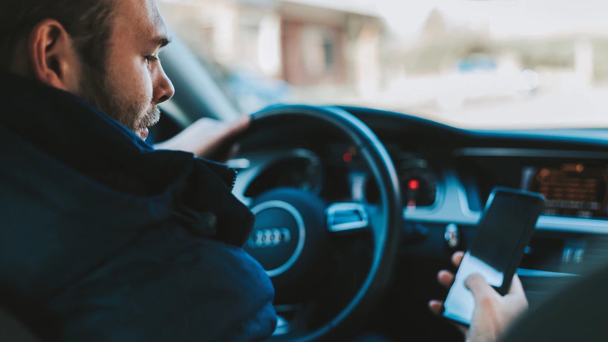 Can't touch this! Georgia's draconian phone-in-car law nets 1000 tickets for 10 days