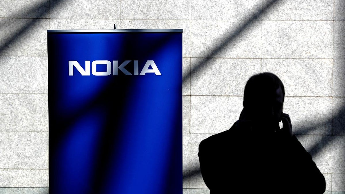 Why did Trump praise Nokia if it is outsourcing American jobs?