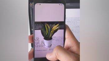 Watch a smartphone camera app take objects from the real world and paste them into Photoshop