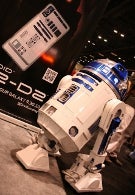 R2-D2 poses for photo opportunity at Star Wars convention in Orlando
