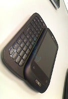 LG C900 is a slide-out QWERTY phone headed to the "premier carrier" for Windows Phone 7 devices
