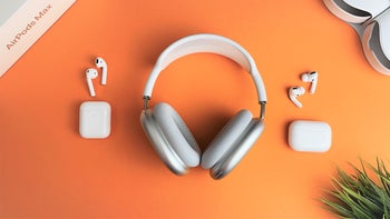 An orange table with different Apple AirPods laid out.