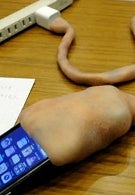 Umbilical cord charger for the iPhone looks like the real thing