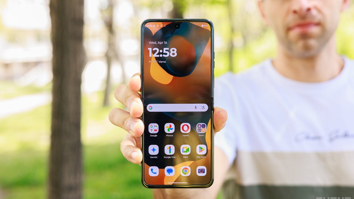 A person holding a Motorola Razr Ultra 2025.