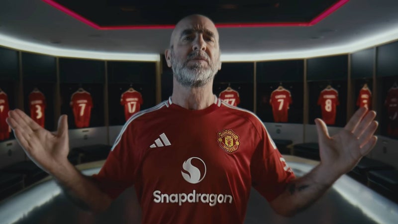 Sports legend Eric Cantona promotes the 2024/25 Snapdragon shirts for Manchester United