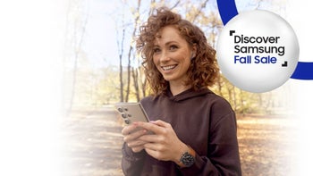 Woman smiling, using Samsung phone and Samsung watch, with Samsung earbuds in