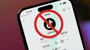 The TikTok app, shown on a smartphone, with a red "forbidden" sign on it, implying that the app will soon be banned.