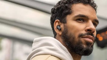 A man listening to music with Bose QuietComfort Earbuds II