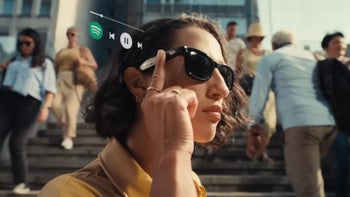 A woman using the Meta Ray-Ban smart glasses in public