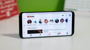 YouTube app in landscape orientation on an Android phone.