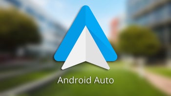 Android Auto logo on a blurred background.