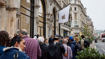 Consumers lining up outside an Apple store in London