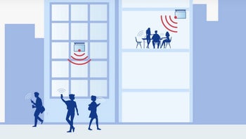 Drawing of a building using glass antennas to turn the windows into 5G basestations.