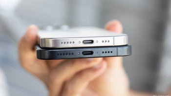 The bottom of two iPhone 16 models on top of each other.