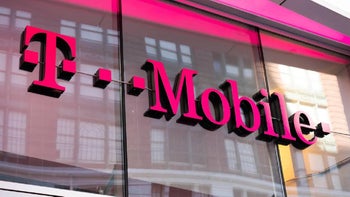 T-Mobile store sign in magenta can be seen above the entrance to a company store.