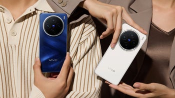 Two people holding vivo X200 smartphones in blue and white colors.