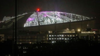 The top of domed baseball stadium Tropicana Field, home to the Tampa Bay Rays, is destroyed thanks to Hurricane Milton.