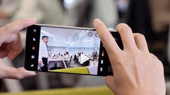 An image of the OPPO Find X8 with the camera button being used