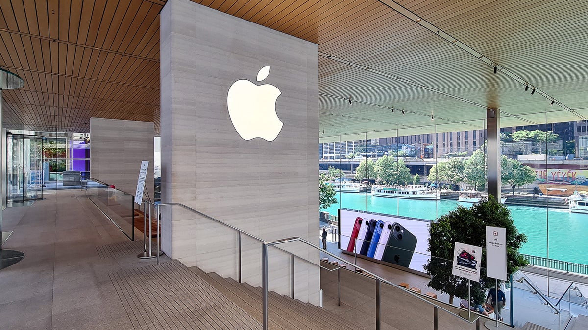 The Apple logo from inside one of the Apple stores.
