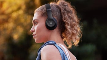 A woman listening to music with her Beats Solo 4