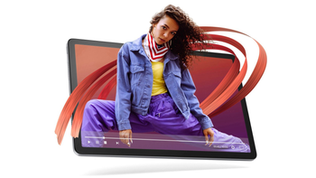 A woman with colorful clothing appears to come out of the Lenovo Tab M11 display.