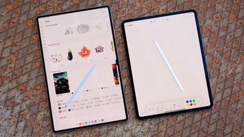 Samsung Galaxy Tab S10 Ultra with S Pen on top of it, next to Apple iPad Pro 13" with Apple Pencil on top of it