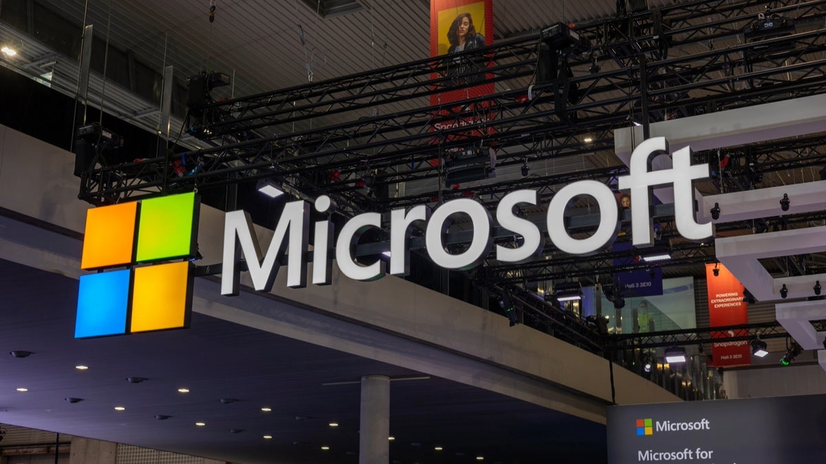 Microsoft's logo on the ceiling in a convention.