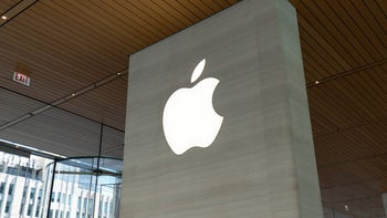 Apple logo on a column in an Apple store.