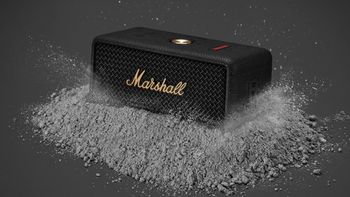 Marshall Emberton III, placed on a pile of ash-like powdery material against a dark gray background.