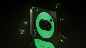 The back of the Nothing Phone (2a) Plus smartphone, showcasing the illuminated Glyph interface.