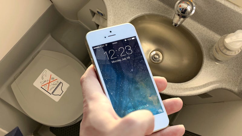 If you worry about losing your iPhone down an airplane toilet, you must watch this video