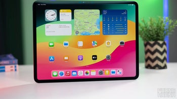 iPad tablet with the iPadOS operating system standing on a desk.