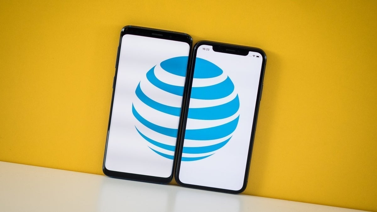 Two phones next to each other, displaying the AT&T logo.