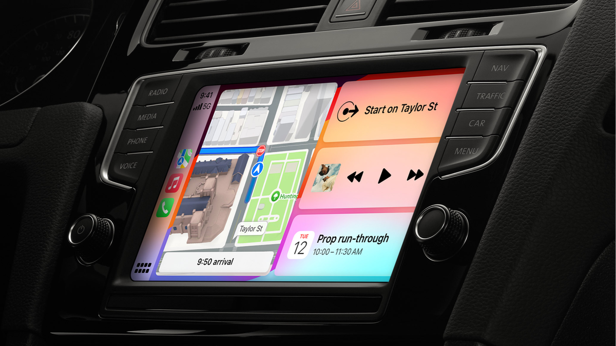 CarPlay on a car's built-in screen with several open apps.