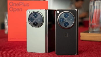 A close-up of two OnePlus Open phones