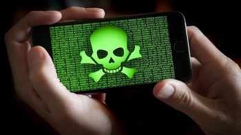 A skull and crossbones are displayed on a phone screen indicating the dangers of getting tricked by the latest threat campaign.