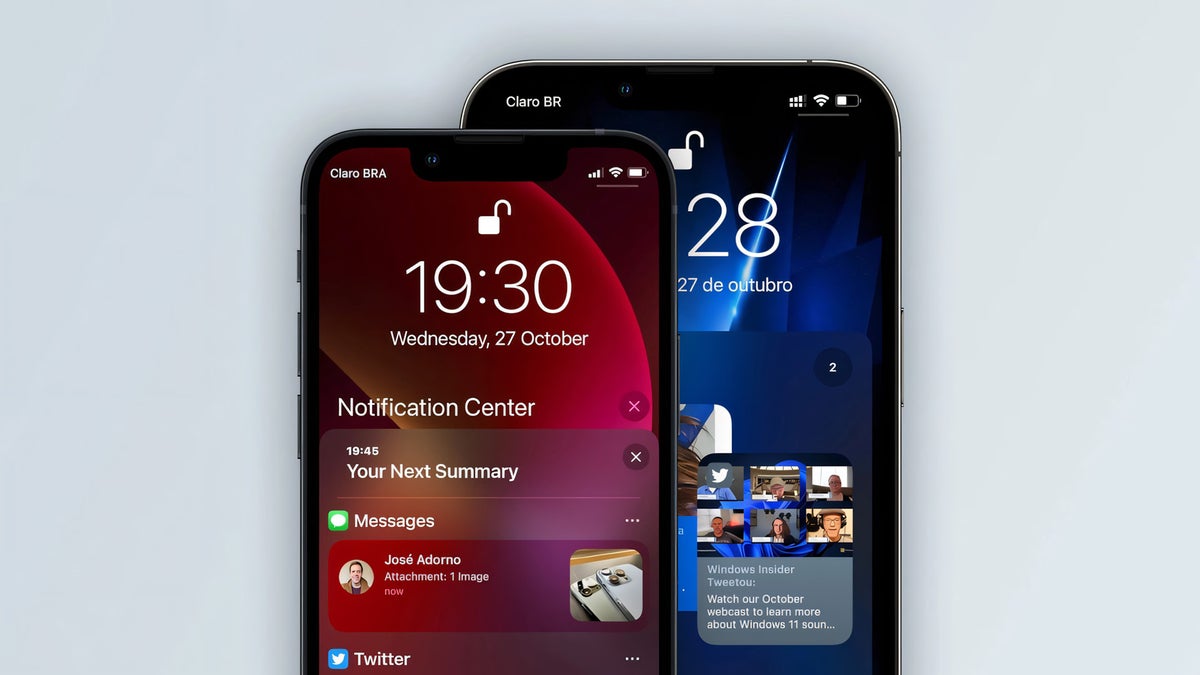 Two iPhones side by side with their displays lit up