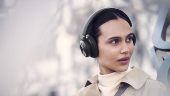 Beoplay HX headphones on a woman's head