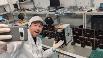 A photo of Mark Rober taking a selfie with a Google Pixel phone