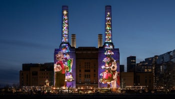 The Battersea Power Station with Apple's new animation on it.