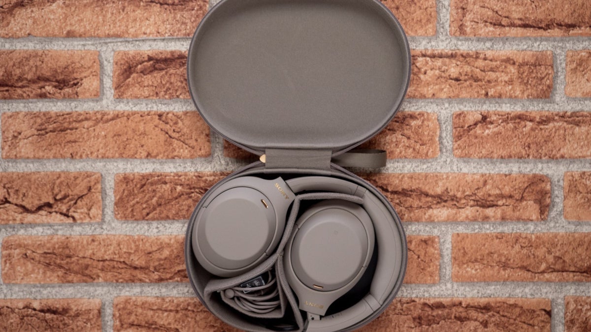 A close-up of the Sony WH-1000XM4 headphones in their case.
