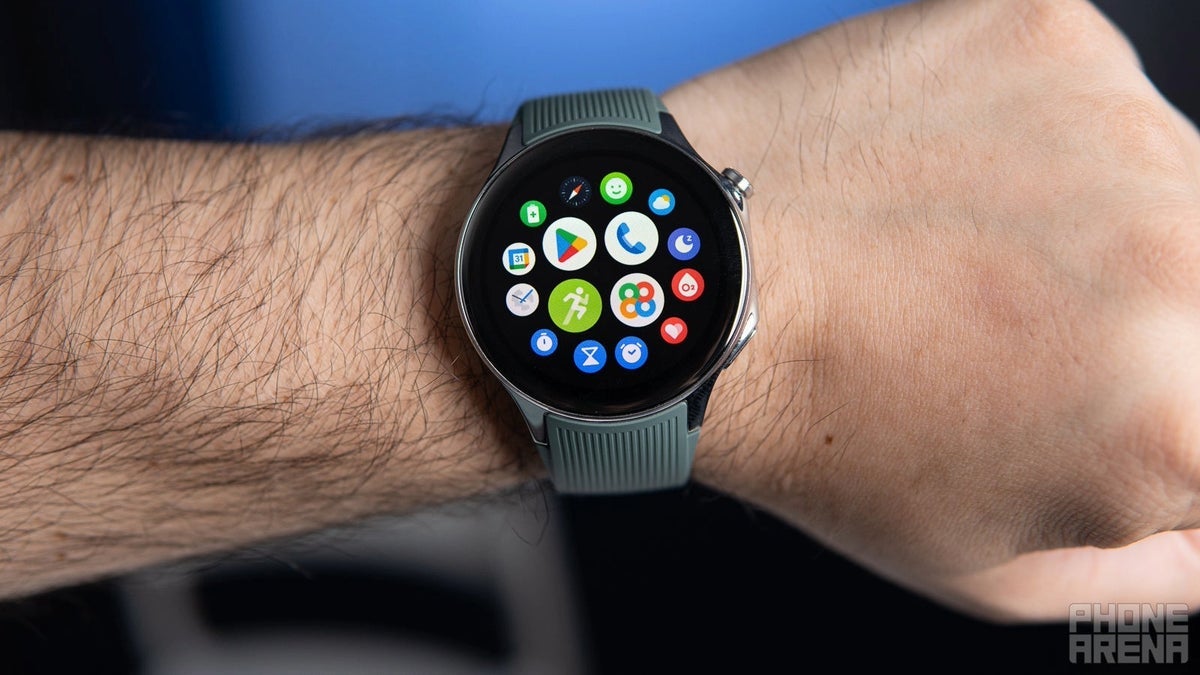 A person wearing an OnePlus Watch 2 on their wrist.