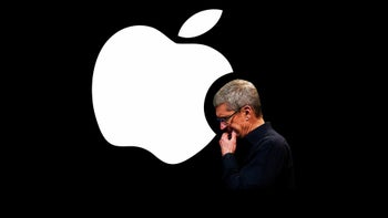 Apple CEO Tim Cook with the Apple logo