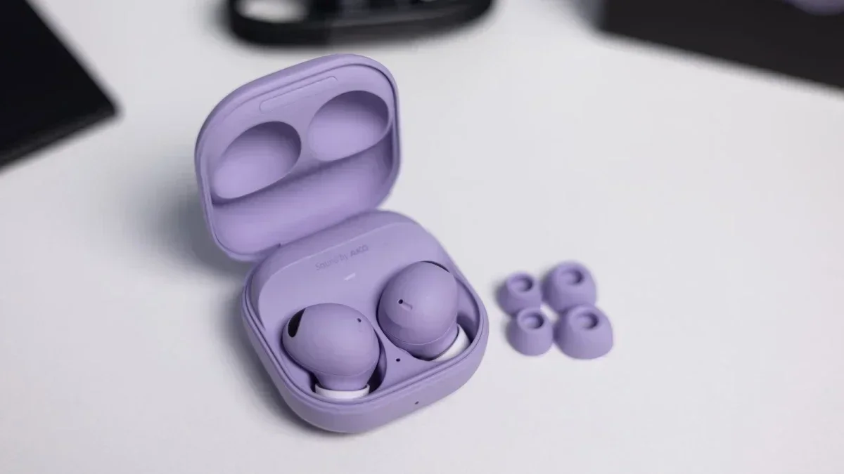 A close-up of the Galaxy Buds 2 Pro earbuds inside their case.