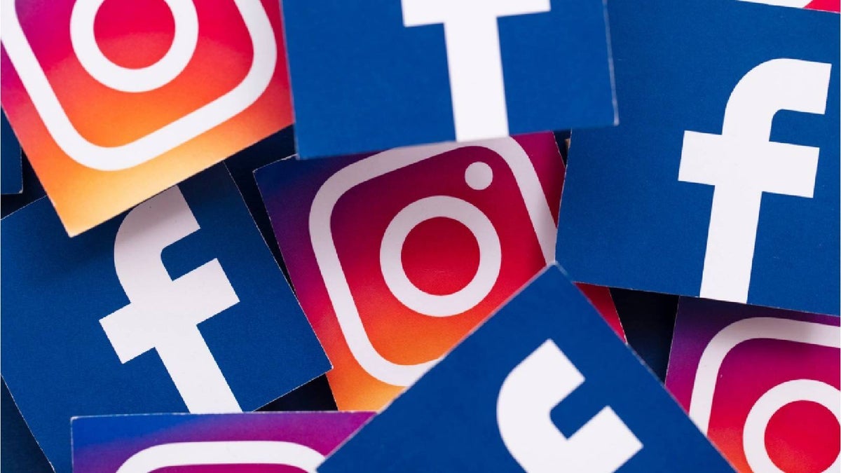 Multiple logos of Facebook and Instagram stacked on top of each other.