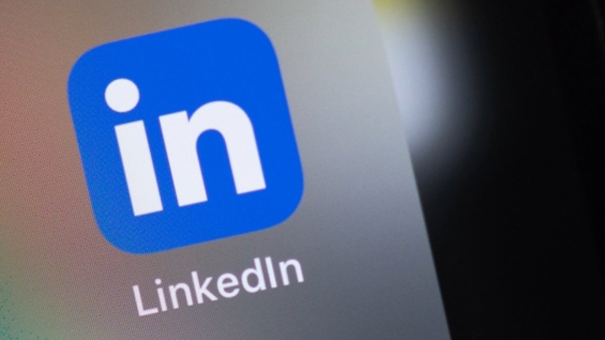 A close up of the LinkedIn app logo on a smartphone screen.
