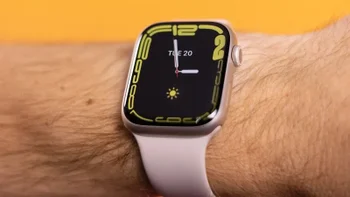 A close-up of an Apple Watch Series 8 on a wrist.